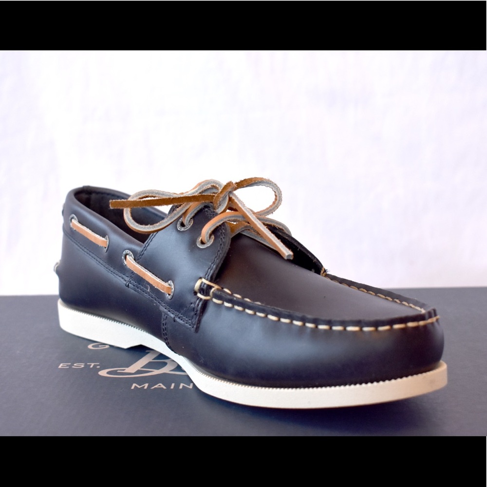 Never worn, men’s navy leather boat shoes